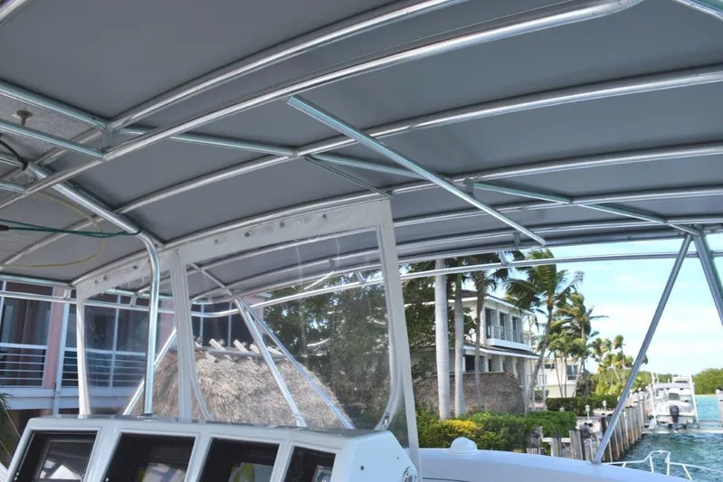 Low Bidder X Yacht Photos Pics Canvas tower top over flybridge