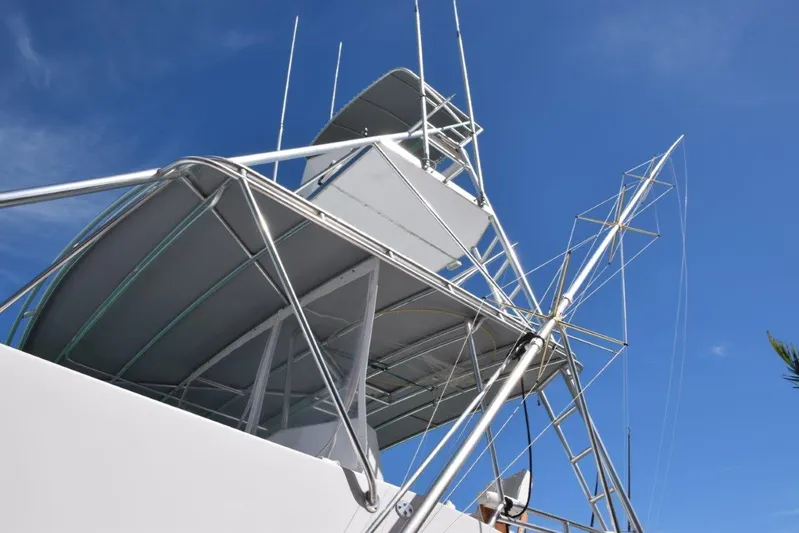 Low Bidder X Yacht Photos Pics Tower with triple spreader outriggers