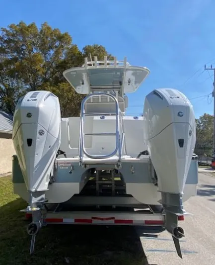 Wcn 51105 280ccx Coastbl Merc Yacht Photos Pics 2024 World Cat 280 CC-X boat with dual outboard engines on a trailer.