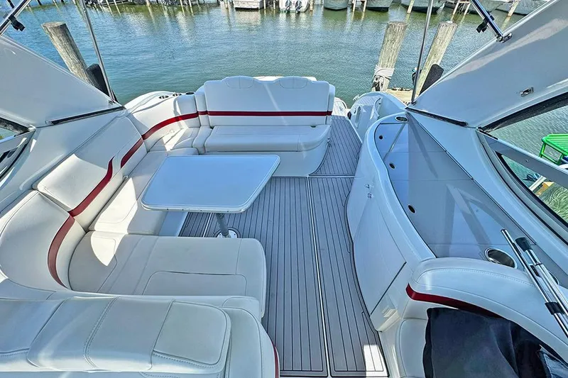 Section 117 Yacht Photos Pics Luxurious 2011 Formula 370 Super Sport yacht interior with white seating and table.