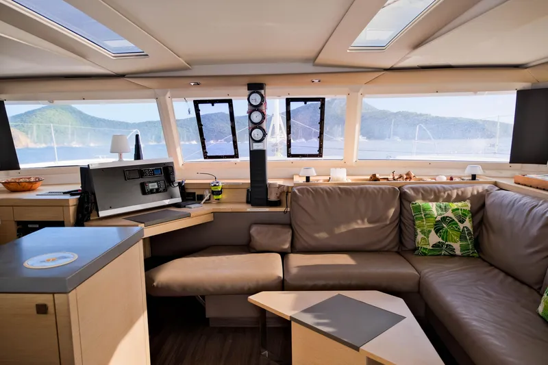 Long Story Yacht Photos Pics Luxurious interior of 2019 Fountaine Pajot Saona 47 catamaran with scenic ocean view.