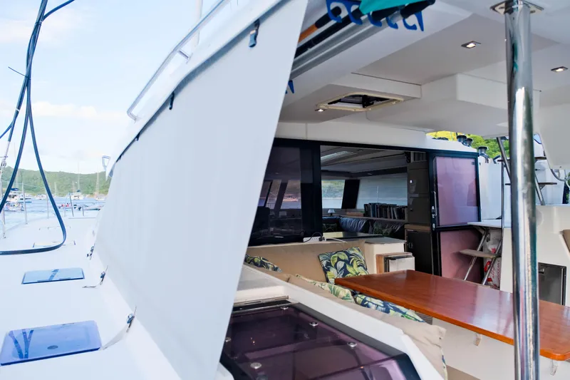 Long Story Yacht Photos Pics 2019 Fountaine Pajot Saona 47 yacht interior with open deck and seating area.
