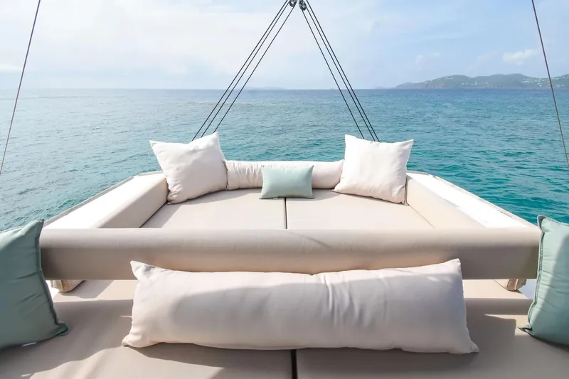 Nae Kae Yacht Photos Pics Luxurious Bali 5.4 yacht deck with cushions, overlooking serene ocean view, 2022 model.
