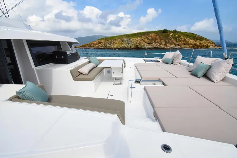 Nae Kae Yacht Photos Pics Luxurious Bali 5.4 yacht deck with comfortable seating, 2022 model, scenic ocean view.