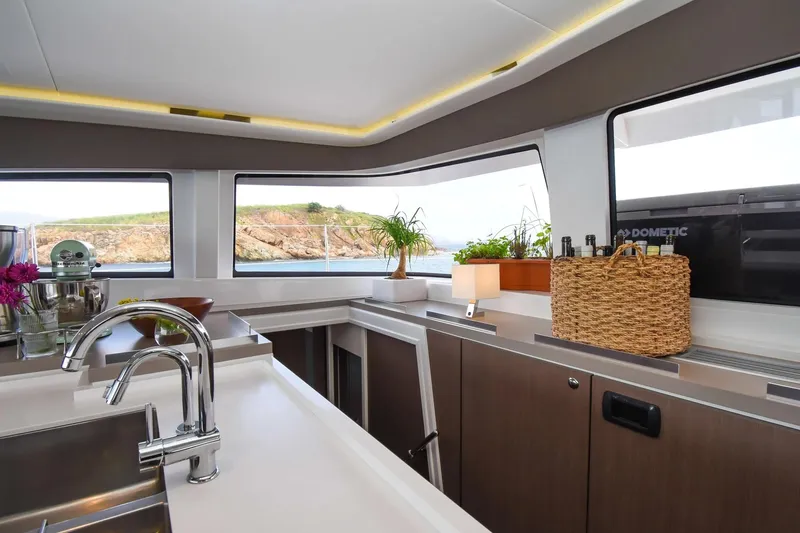 Nae Kae Yacht Photos Pics Modern kitchen interior on 2022 Bali 5.4 yacht with ocean view and sleek design.