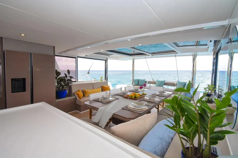 Nae Kae Yacht Photos Pics Luxurious Bali 5.4 yacht interior, 2022 model, featuring elegant dining area with ocean view.