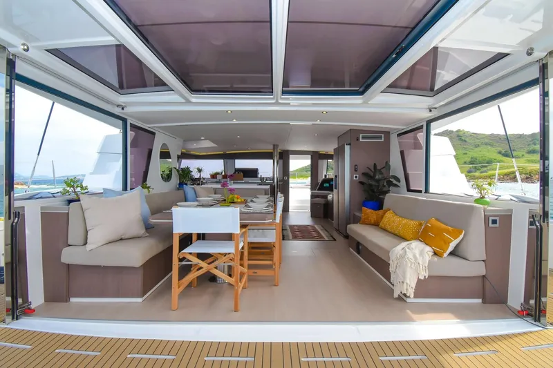 Nae Kae Yacht Photos Pics Luxurious interior of 2022 Bali 5.4 yacht with spacious seating and elegant decor.