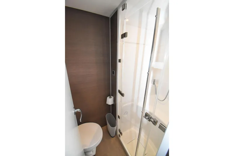 Nae Kae Yacht Photos Pics Compact bathroom in 2022 Bali 5.4 model with shower and toilet.