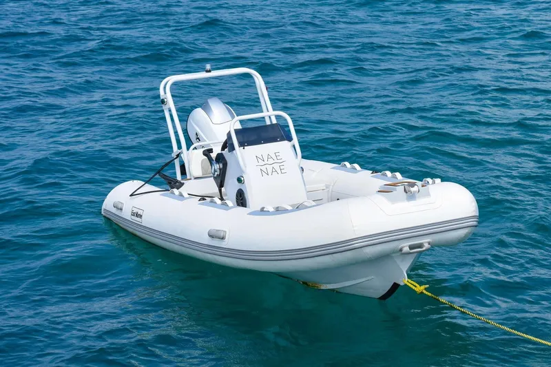 Nae Kae Yacht Photos Pics White Bali 5.4 inflatable boat, 2022 model, floating on clear blue water.