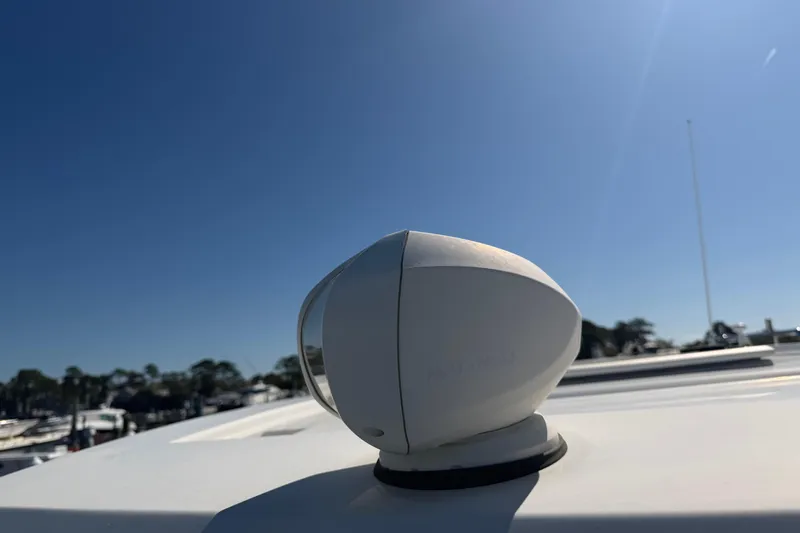 Chasin' Hyde Yacht Photos Pics Rooftop detail of 2023 Aquila 36 Sport against clear blue sky.
