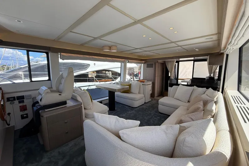 Dolce Far Niente Yacht Photos Pics Luxurious interior of 2024 Azimut Magellano 60 yacht with plush seating and modern design.