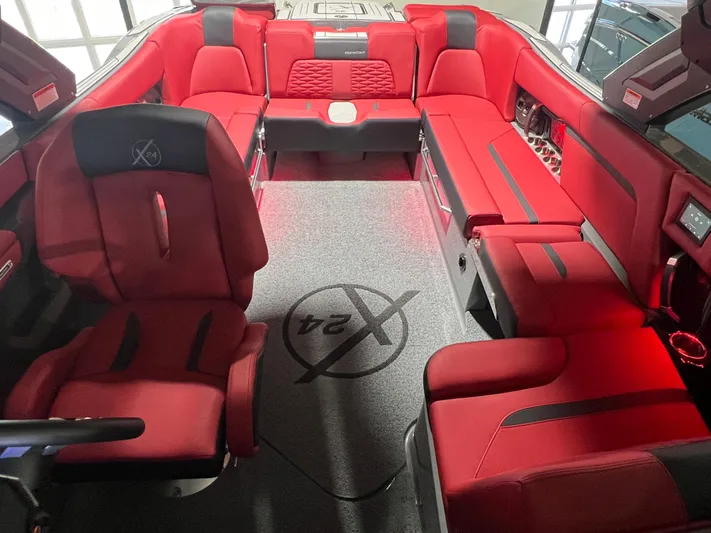  Yacht Photos Pics 2025 MasterCraft X24 boat interior with luxurious red seating and modern design.