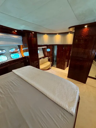  Yacht Photos Pics Luxurious cabin interior of 2003 Astondoa 82 yacht with elegant wood finishes.