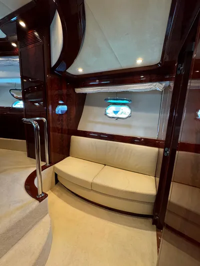  Yacht Photos Pics Luxurious interior of 2003 Astondoa 82 yacht with elegant seating and polished wood finishes.