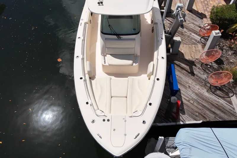  Yacht Photos Pics 2021 Grady-White Canyon 336 boat docked, aerial view showing spacious deck and seating.