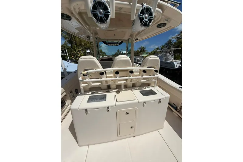  Yacht Photos Pics 2021 Grady-White Canyon 336 boat interior with seating and storage compartments.