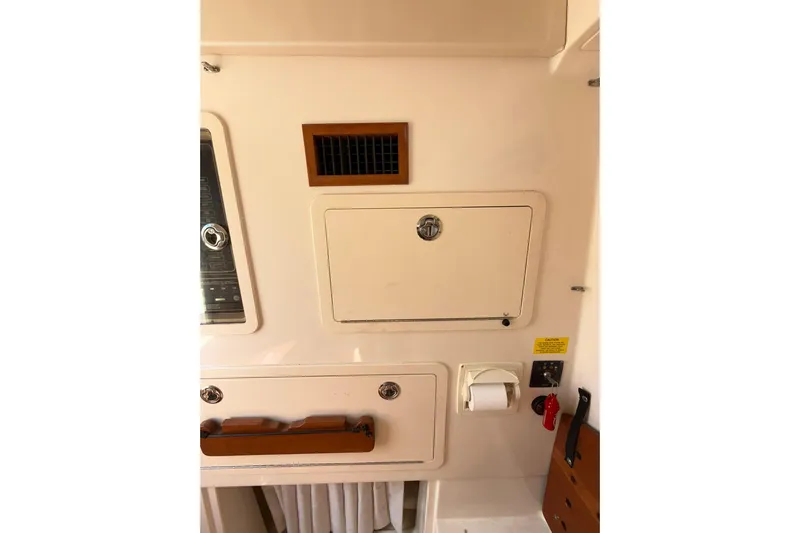  Yacht Photos Pics Interior view of a 2021 Grady-White Canyon 336 boat, featuring storage compartments.