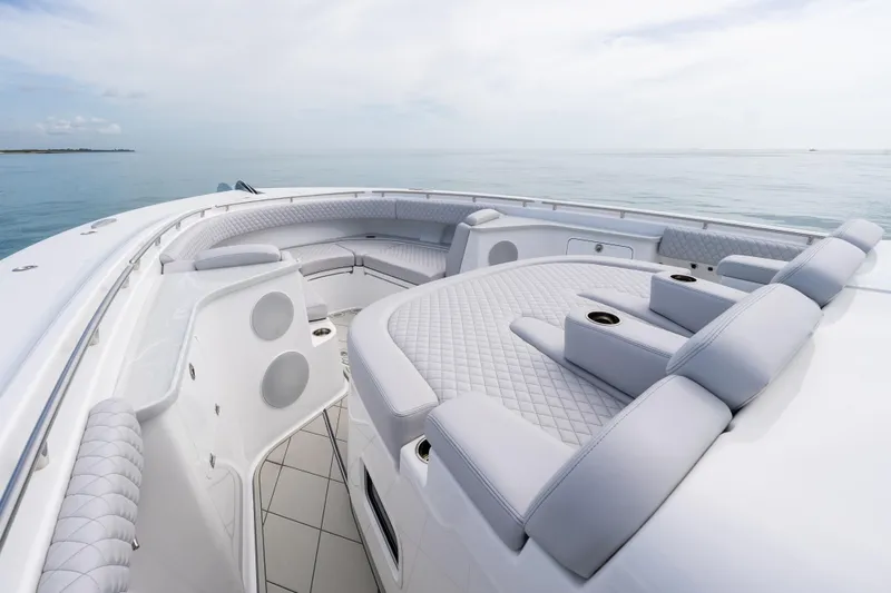  Yacht Photos Pics Luxurious seating area on the 2025 HCB 56 Suenos GIX yacht, featuring elegant design.