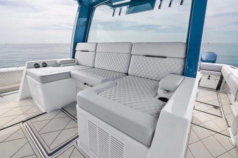  Yacht Photos Pics Luxurious seating on the 2025 HCB 56 Suenos GIX boat, featuring quilted upholstery.