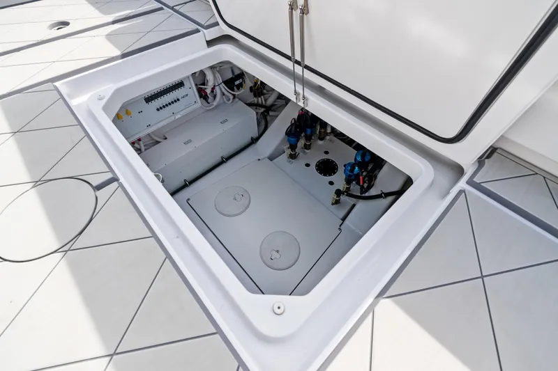  Yacht Photos Pics Open hatch of 2025 HCB 56 Suenos GIX, revealing internal components and wiring.