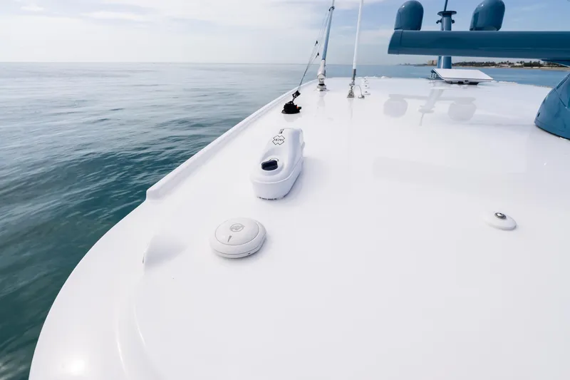  Yacht Photos Pics 2025 HCB 56 Suenos GIX boat deck on calm ocean waters.