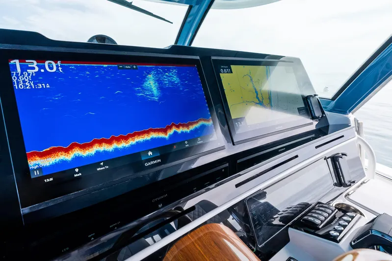  Yacht Photos Pics Helm of 2025 HCB 56 Suenos GIX with advanced navigation displays.