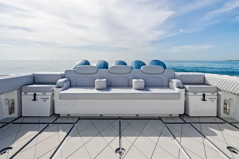  Yacht Photos Pics Luxury seating on 2025 HCB 56 Suenos GIX boat, ocean backdrop.