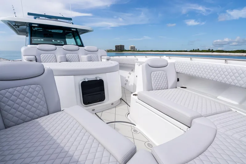  Yacht Photos Pics Luxurious seating on 2025 HCB 56 Suenos GIX yacht, featuring elegant white upholstery.