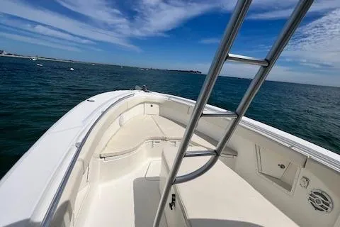 The Buck-a-neer Yacht Photos Pics 2005 Hydra-Sports Vector 3300 CC boat on open water under blue sky.