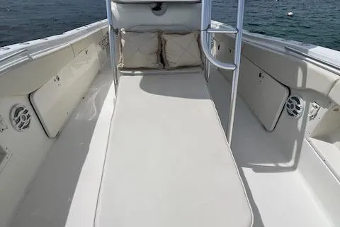 The Buck-a-neer Yacht Photos Pics 2005 Hydra-Sports Vector 3300 CC boat interior with cushioned seating and open deck.