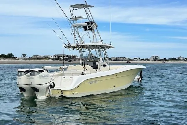 The Buck-a-neer Yacht Photos Pics 2005 Hydra-Sports Vector 3300 CC boat with dual Suzuki engines on calm water.