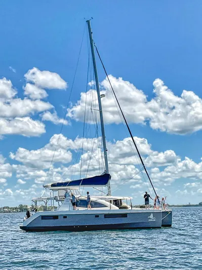 Jubilee Yacht Photos Pics 2015 Leopard 48 catamaran sailing on a sunny day with clear skies.