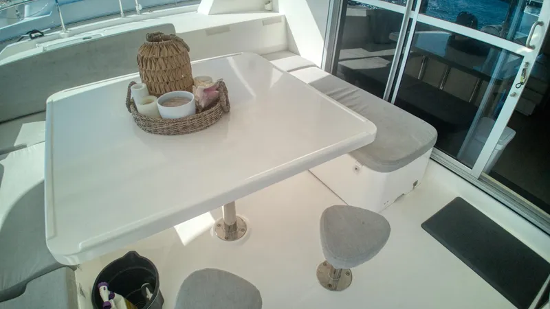 Jubilee Yacht Photos Pics Leopard 48 yacht interior with dining table and seating, 2015 model.