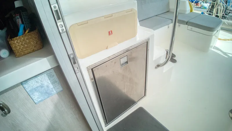 Jubilee Yacht Photos Pics Interior of a 2015 Leopard 48 yacht featuring a compact storage area.