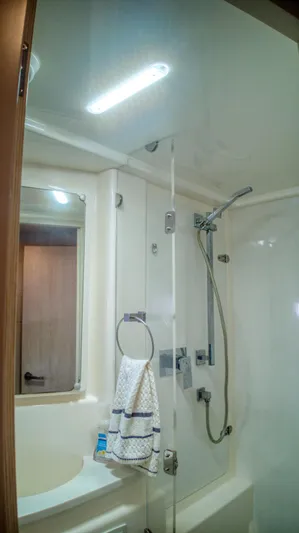 Jubilee Yacht Photos Pics Leopard 48 yacht bathroom, modern shower, towel rack, mirror, 2015 model.