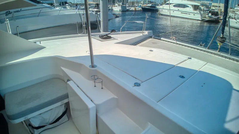 Jubilee Yacht Photos Pics Leopard 48 catamaran deck, 2015 model, docked at marina with other yachts.