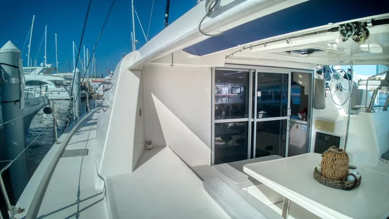 Jubilee Yacht Photos Pics Luxurious 2015 Leopard 48 yacht docked, featuring spacious deck and modern design.