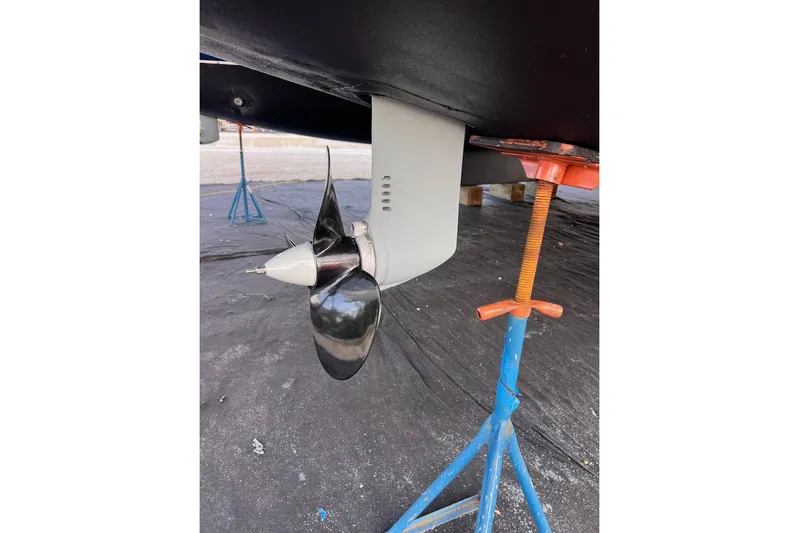 Jubilee Yacht Photos Pics Propeller of 2015 Leopard 48 yacht on a stand, showcasing marine engineering.