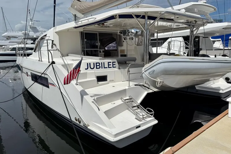 Jubilee Yacht Photos Pics 2015 Leopard 48 yacht named "Jubilee" docked with inflatable boat and American flag.