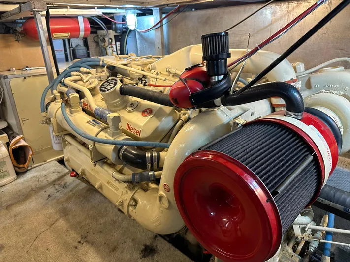 Luv'n Life Yacht Photos Pics Engine room of a 1989 Atlantic 47 Motor Yacht with diesel engine components.