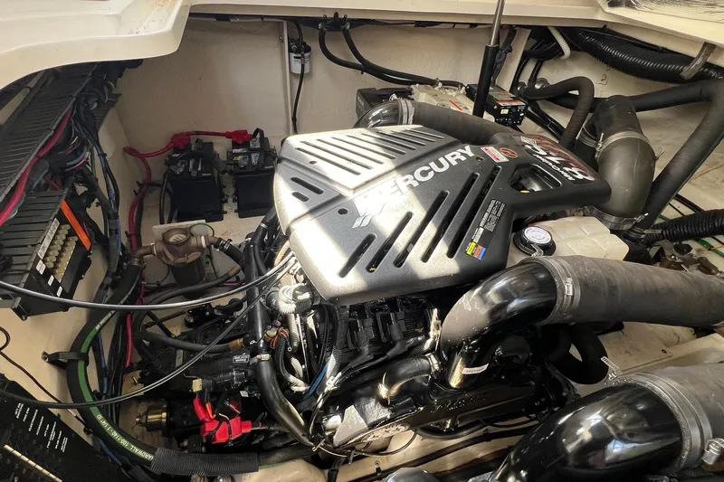  Yacht Photos Pics Engine compartment of a 2005 Sea Ray 340 Sundancer with Mercury engine components.
