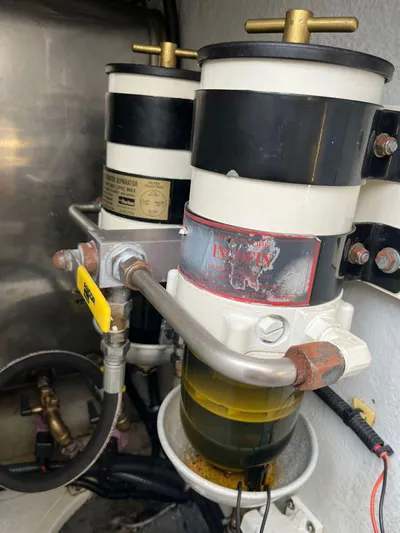  Yacht Photos Pics Engine components of a 2005 Azimut 43 yacht, featuring fuel filters and piping.