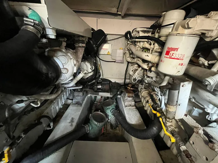  Yacht Photos Pics Engine room of a 2005 Azimut 43 yacht, showcasing mechanical components and systems.