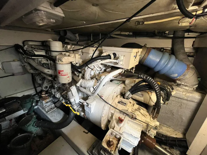  Yacht Photos Pics Engine room of a 2005 Azimut 43 yacht, showcasing complex machinery and wiring.