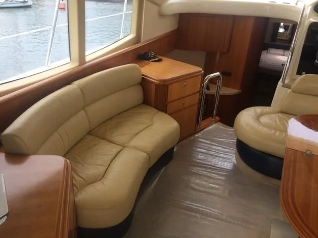  Yacht Photos Pics Luxurious interior of a 2005 Azimut 43 yacht with beige leather seating.