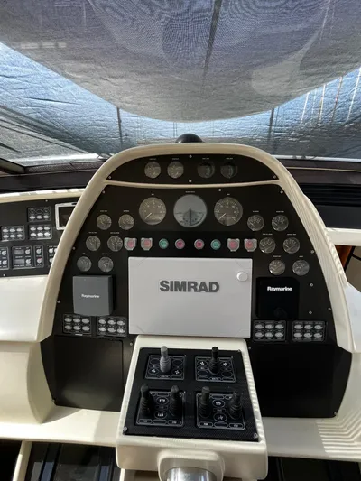  Yacht Photos Pics Control panel of a 2004 Pershing 76 yacht with Simrad navigation system.