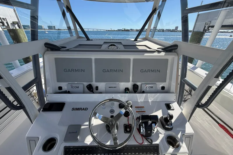  Yacht Photos Pics Invincible 40 Catamaran 2022 helm with Garmin displays and Simrad controls.