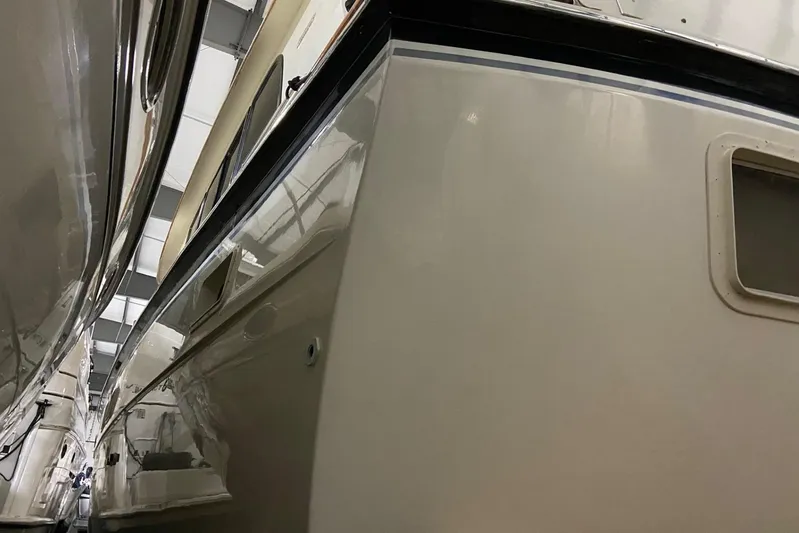  Yacht Photos Pics 1985 Hatteras 53 Extended Deckhouse Motor Yacht in storage, side view.