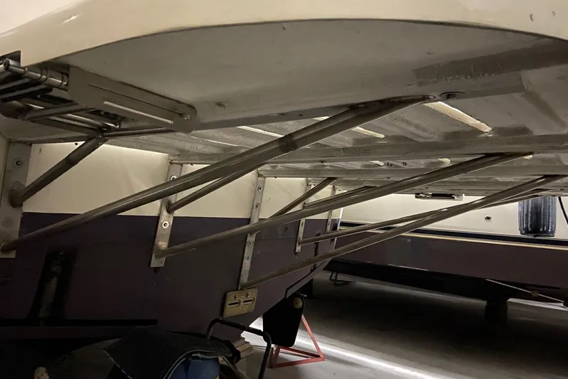  Yacht Photos Pics 1985 Hatteras 53 Extended Deckhouse Motor Yacht underside view with metal support structure.