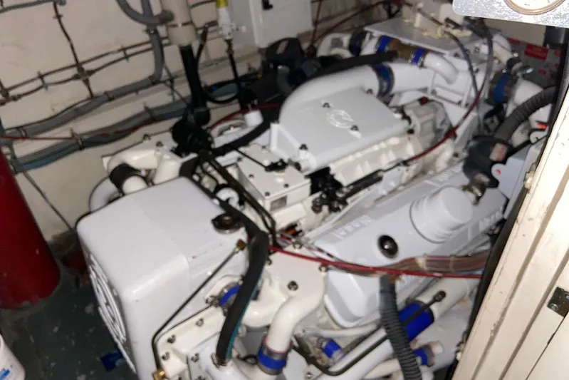  Yacht Photos Pics Engine room of 1985 Hatteras 53 Extended Deckhouse Motor Yacht, showcasing mechanical components.